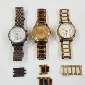 Three Michael Kors watches